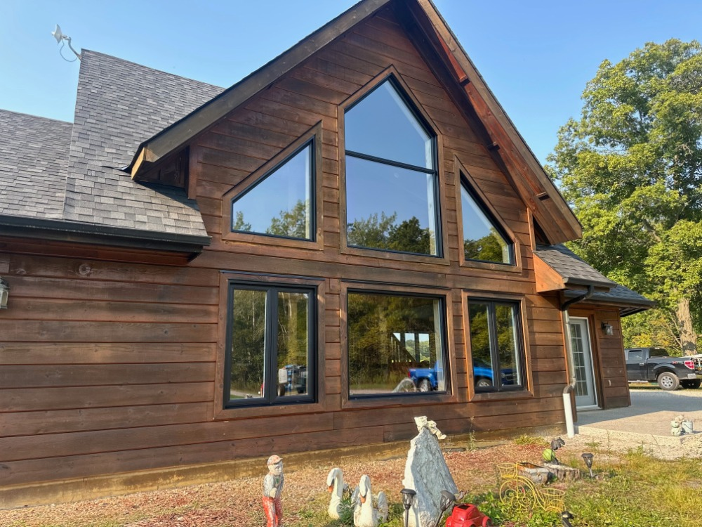 Timber-clad lakeside home