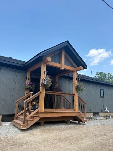 Timber-framed covered entry porch