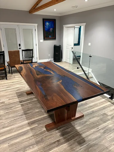 Live-edge walnut dining table with epoxy river